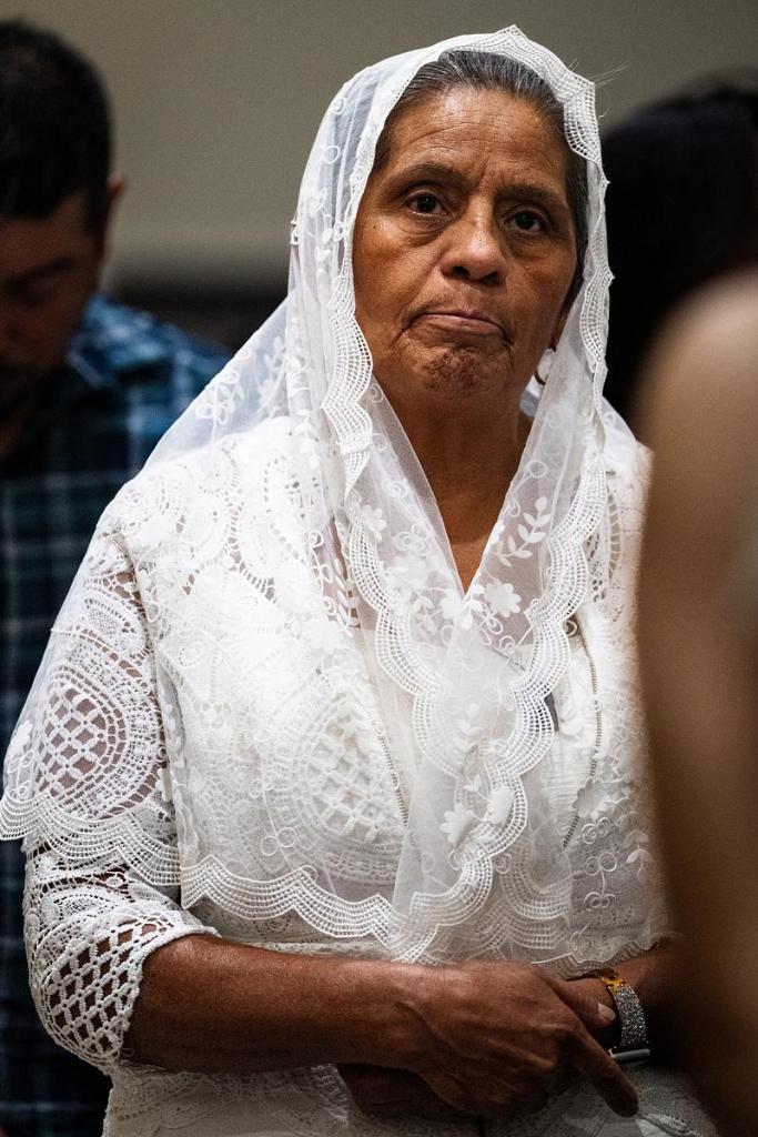 A Tulsan stands during the noon Easter service at St. Francis Xavier Catholic Church April 5, 2026. The church is hosting centennial celebrations to mark its founding in 1926. 
