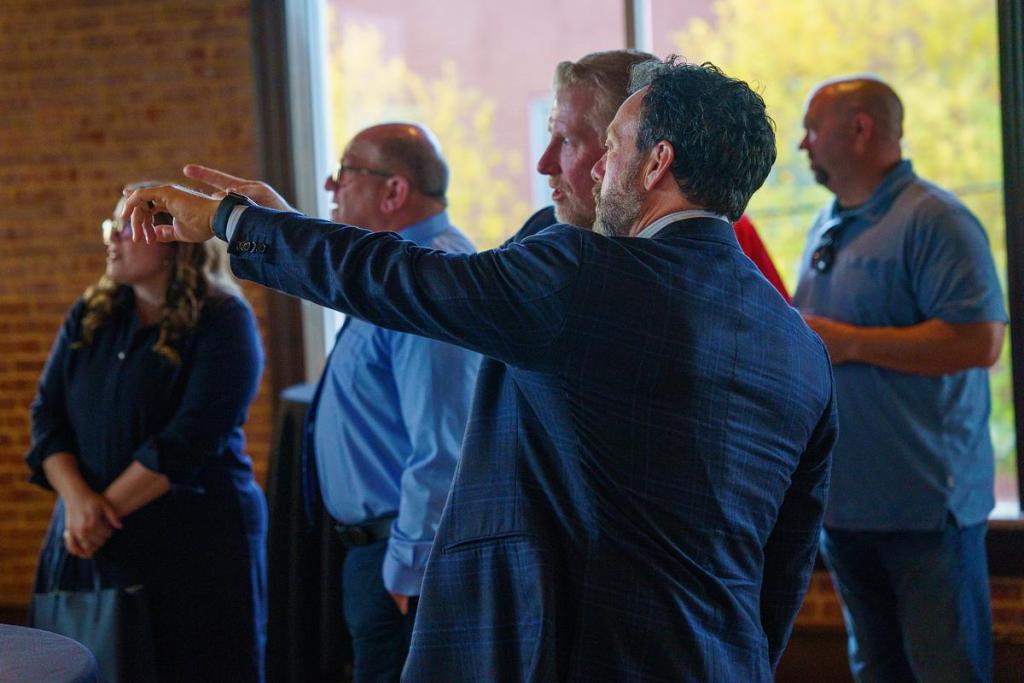 Broken Arrow residents and city officials gather at a watch party at Main Street Tavern in Broken Arrow April 7, 2026, as they await results of a $415 million general obligation bond election. A sales tax increase for sports facilities failed. 