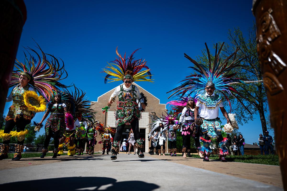 Danza Santa Cruz performs during the noon Easter service at east Tulsa's St. Francis Xavier Catholic Church April 5, 2026. The church is marking 100 years this month.