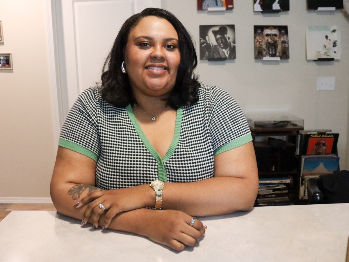 Kennedy Dixon poses for a photo in her home Thursday, April 2, 2026. Dixon bought her house in north Tulsa two years ago for $170,000.