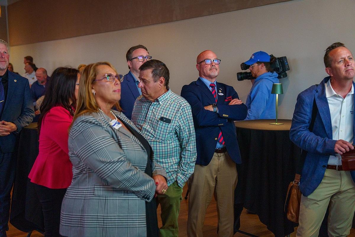 Broken Arrow residents and city officials gather at a watch party at Main Street Tavern in Broken Arrow April 7, 2026, as they await results of a $415 million bond election. The election included eight propositions focused on city improvements.