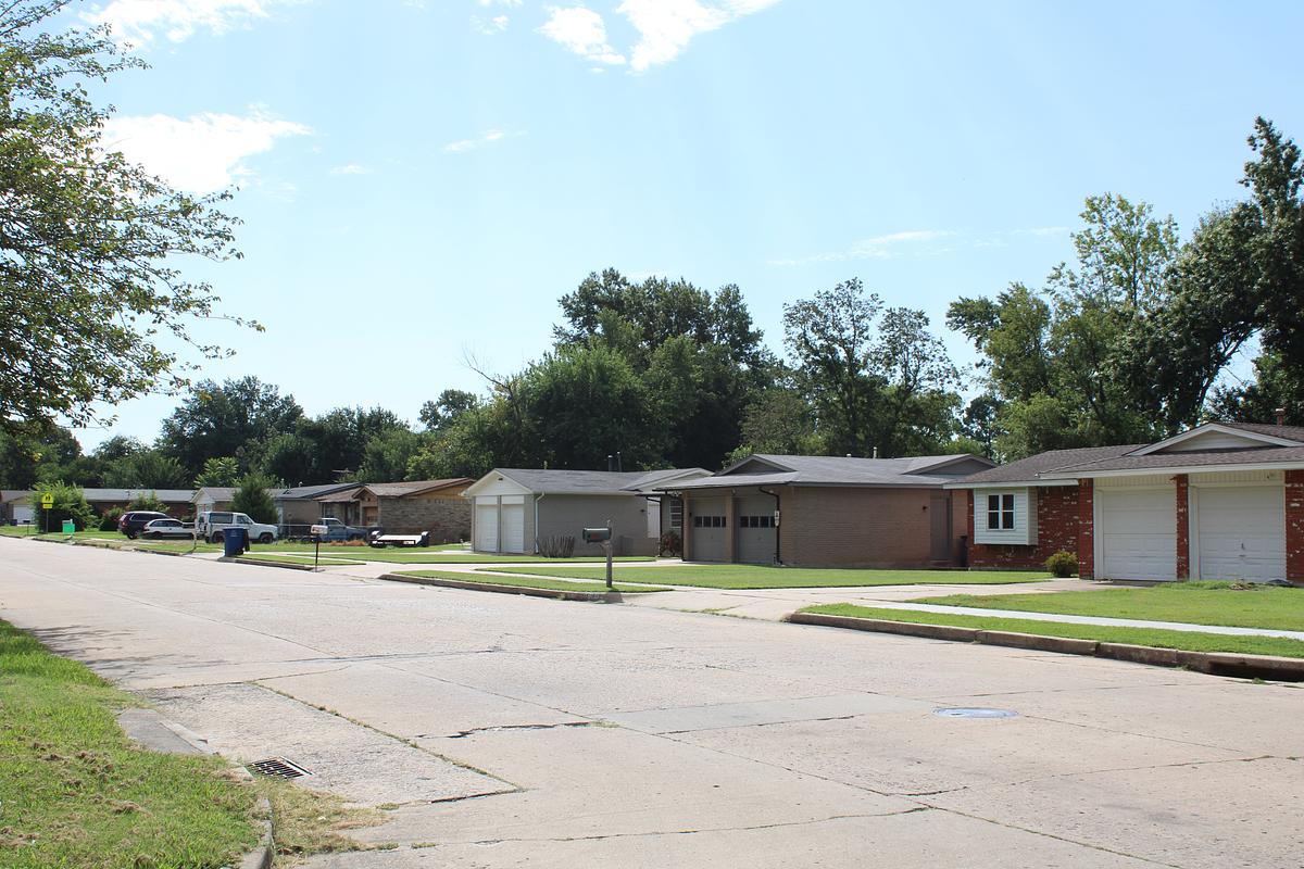 Single-family homes sit near Walt Disney Elementary School in east Tulsa in August 2025.