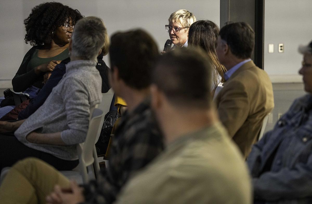 An attendee comments at the first meeting of the Tulsa Flyer Book Club, where they discussed "Black Moses" by Caleb Gale. Gary Lee, executive editor of the The Oklahoma Eagle and Tulsa Flyer, and Tim Landes moderated.
