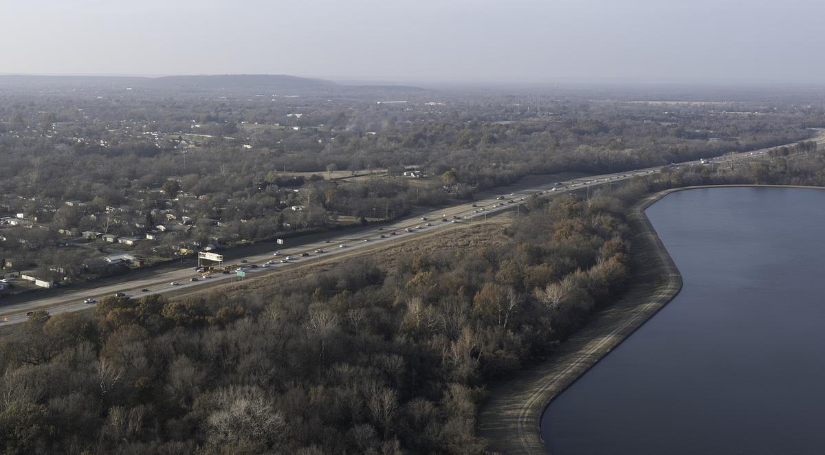 Traffic whizzes along U.S. Highway 75 near Lake Yahola in north Tulsa on Dec. 5, 2025.