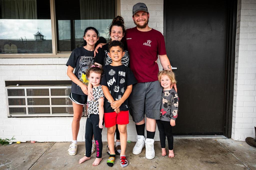 The Mason family poses for a portrait at Wings of Freedom Saratoga Sober Living Center April 14, 2026. The center helps people struggling with addiction get clean and gives them a place to live with their family free of substances. 