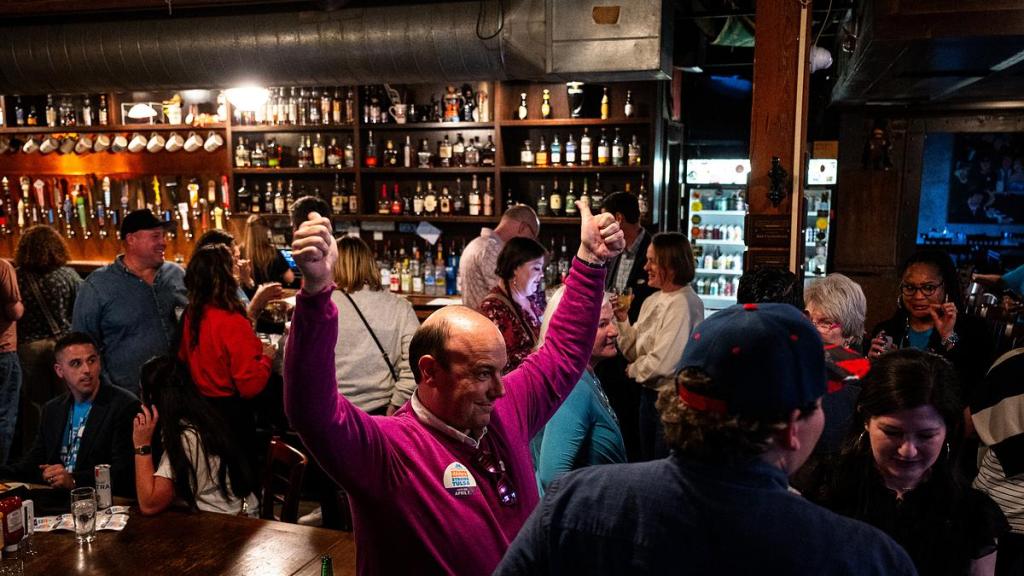 Tulsa Public Schools board member Calvin Moniz celebrates Connie Dodson's win and election as the newest member of the school board during the Tulsa Public Schools bond watch party at McNellie's April 7, 2026. 