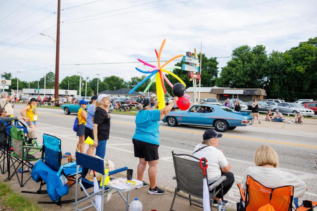 Spectators line up along E. 11th St. to kick off the the Route 66 Capital Cruise, a Guinness World Record attempt for the largest classic car parade ever on Saturday, May 30, 2026 in Tulsa, Oklahoma.