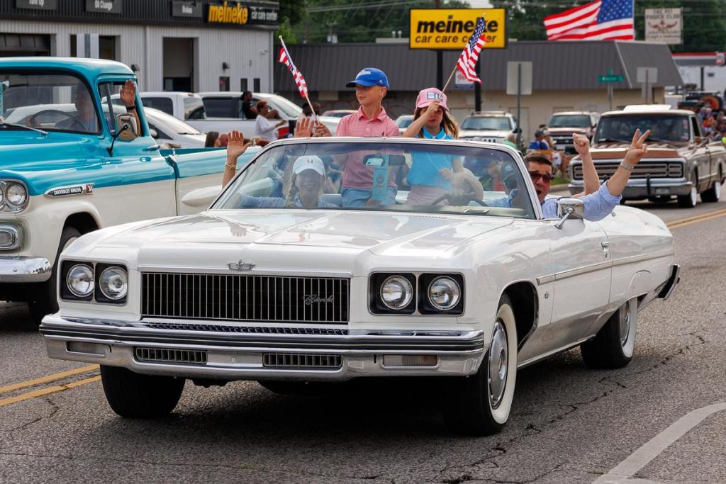 Lt. Gov. Matt Pinnell waves at spectators from a 1960 Buick Electra 225 convertible during the Route 66 Capital Cruise May 30, 2026.
