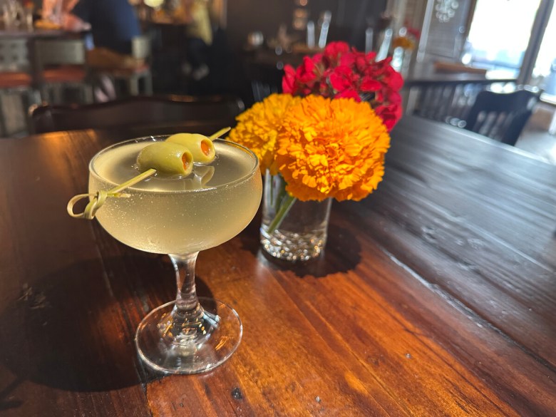 Known for their $4 martini, Bird & Bottle offers half-priced small plate items during their happy hour.