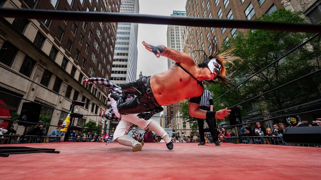 Luchadors wrestle during the Cinco De Mayo Luchador Wrestling event outside Elote Cafe & Catering on Tuesday, May 5, 2026.