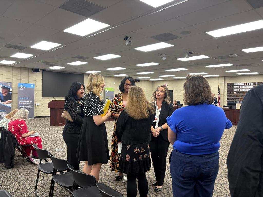 Tulsa Public Schools staff members commend fifth grader Maisy Archer for speaking in front of the board about school meals Monday, May 4, 2026.