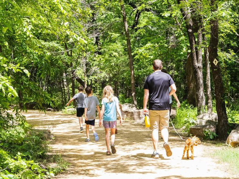 A family hikes at Tulsa's Turkey Mountain, 6800 S. Elwood Ave.
