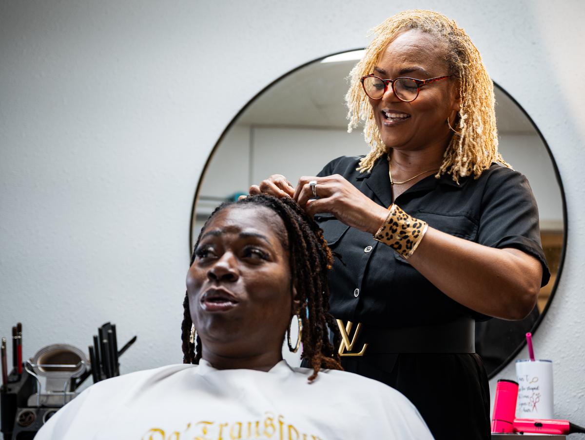 Tonya Johnson styles Joyce Lowe's hair at Nu Xpressions on Tuesday, May 21, 2026. Johnson has been doing hair for nearly 30 years.