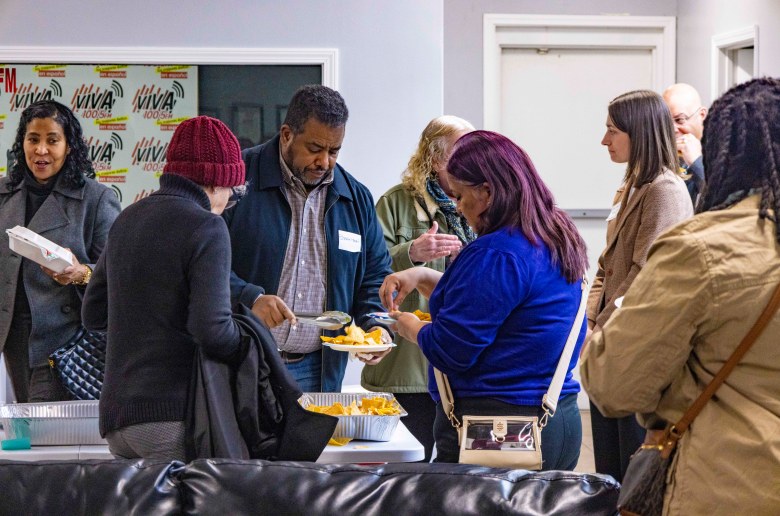 Residents pick up food during a Jan. 29, 2026, Tulsa Flyer and Oklahoma Eagle meet and greet at Que Buena.