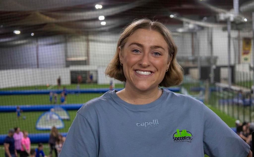 Kendall Quillman, pictured June 13, 2026, is the Lil' Kickers coordinator at SoccerCity in east Tulsa. She grew up playing and returned to coach as an adult. 