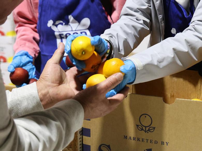 Food on the Move volunteers distribute food in northwest Tulsa on Oct. 28, 2025.