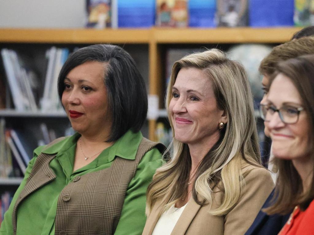 TPS Chief Financial Officer Kristin Stephens, center, is pictured during an event with Gov. Kevin Stitt at Eisenhower International School on Oct. 2, 2025.
