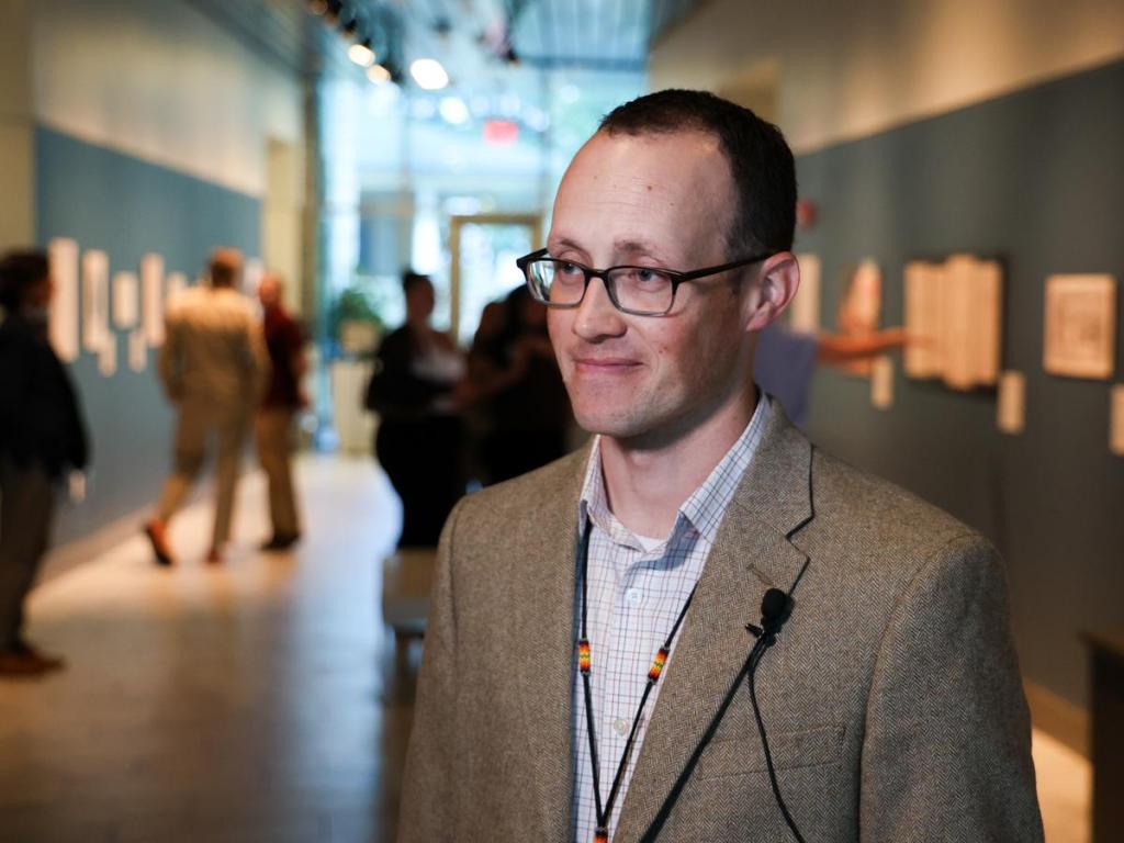 William Smith, a Cherokee Nation citizen who serves as director of the Helmerich Center for American Research, stands in the exhibit "Indigenous Independence" on June 10, 2026.