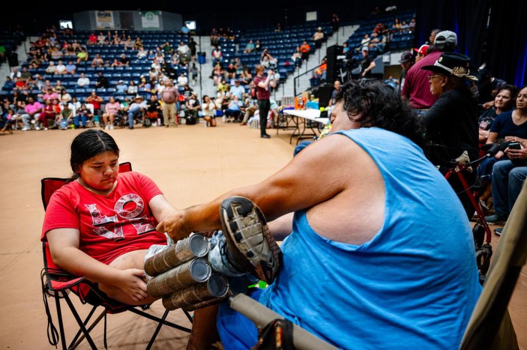 Matti Wilson prepares to take part in the stomp dance during the Muscogee Nation Festival in Okmulgee on Thursday, June 25, 2026.
