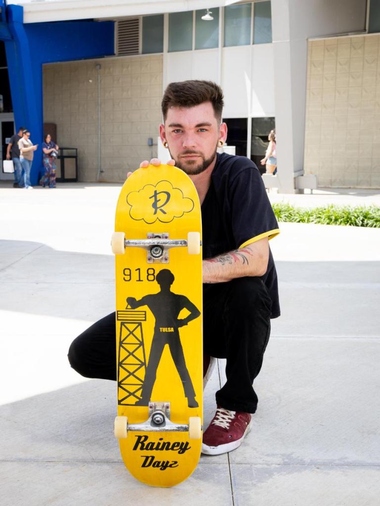 Jordan Simpson with the custom deck from Rainey Dayz Skateboards that honors the Golden Driller on June 20, 2026. 