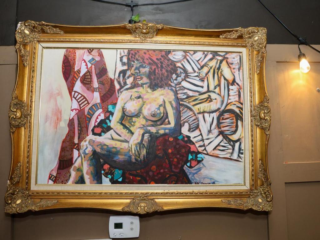 This painting inside YBR Pub has long been a patron favorite and a popular conversation piece. 