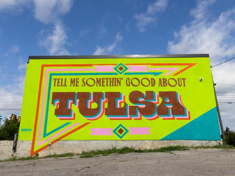 A mural created by Hightail Creative for Habit Mural Festival that can be seen on the east wall of Center for Public Secrets, 573 S. Peoria Ave.