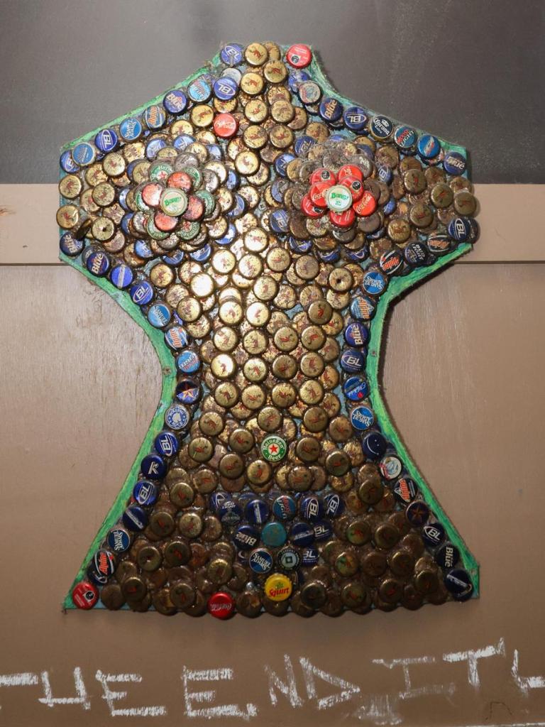 This artwork made from bottle caps has been a longtime fixture of YBR Pub.