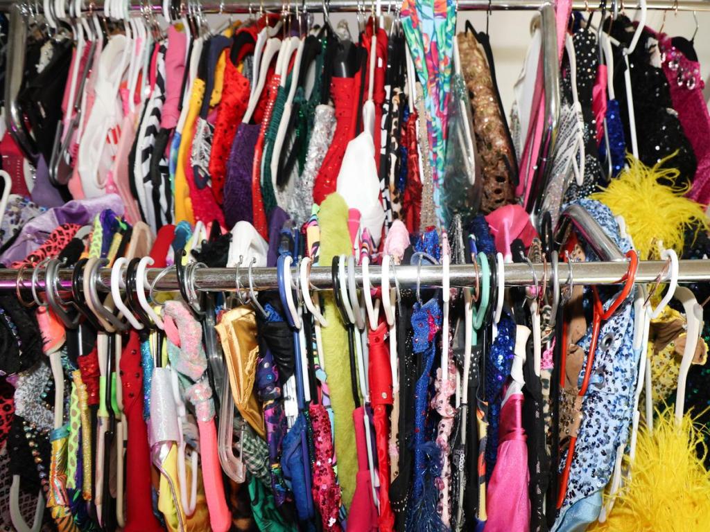Many of the outfits on racks that Travis Guillory wears as Tracy La Louisianne.