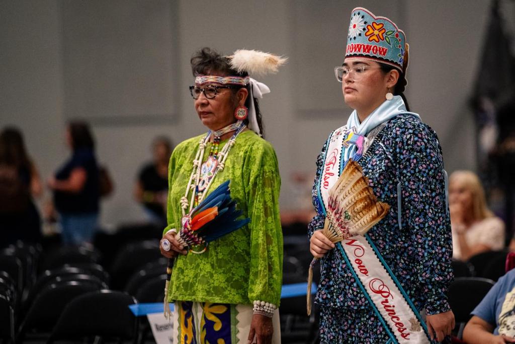 Powwow princess Madison Gayle Bighorse (right) dances during the gourd dance during the 74th annual Tulsa Powwow at the Avest Convention Center Saturday, July 25, 2026.