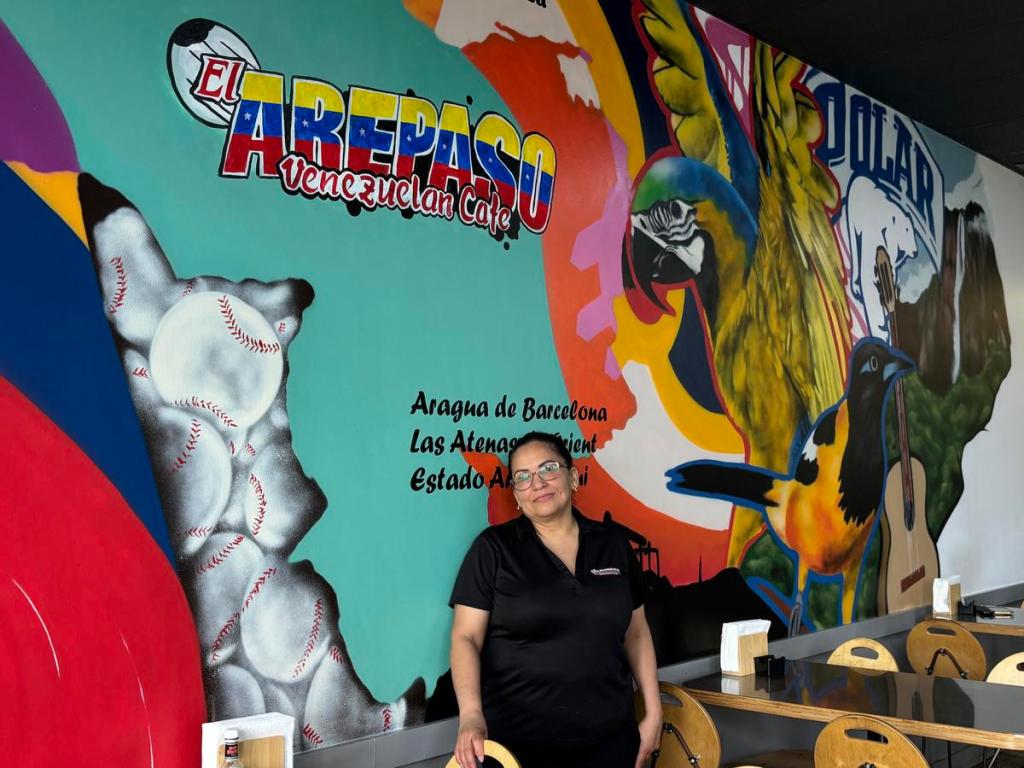 Carolina Marino stands for a portrait July 7, 2026, at her restaurant El Arepaso Venezuelan Cafe in south Tulsa. The restaurant partnered with Angeles en Tulsa to gather donations for Venezuela. 