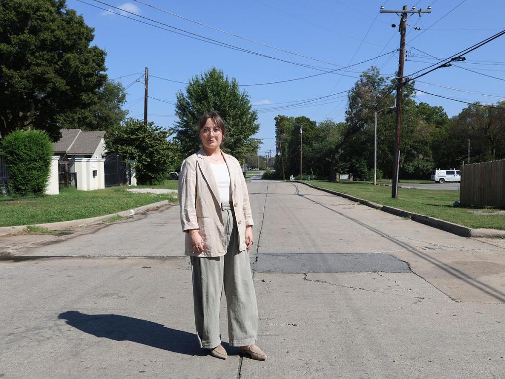 Emily DelGrosso stands in her midtown Tulsa neighborhood. In addition to serving as a notary, she's been an outspoken advocate for making more city resources available in Spanish. 