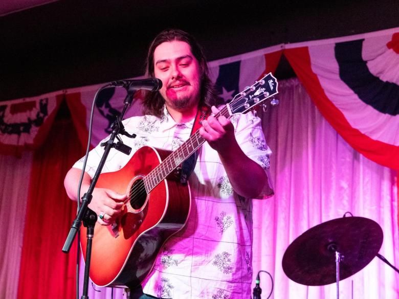 Agalisiga Mackey plays a song during Kalyn Fay's album release show on April 24, 2026.