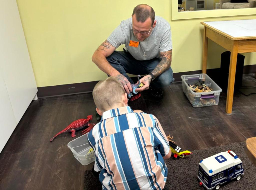 Josh Rousseau takes time to play with his son, Joshua. He and his wife have taken nearly every parenting program at the Parent Child Center of Tulsa, part of the 116% increase in demand for the nonprofit's programs. He helped expand an existing fatherhood program. 