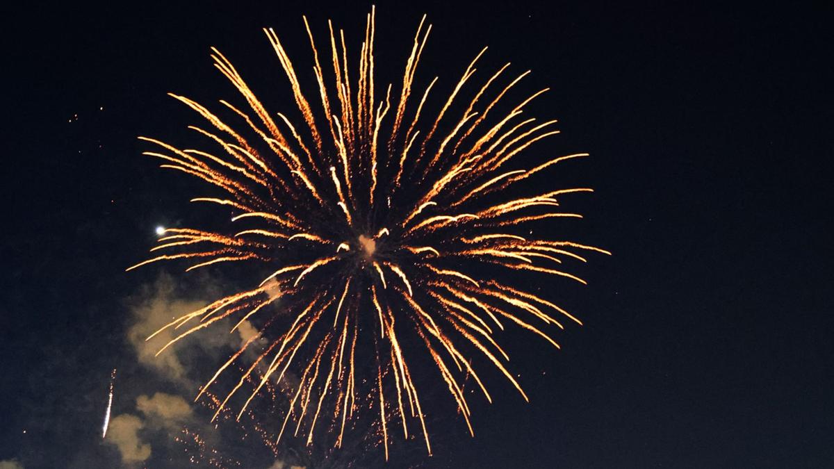 Fireworks explode over the Arkansas River during FreedomFest on July 4, 2025.