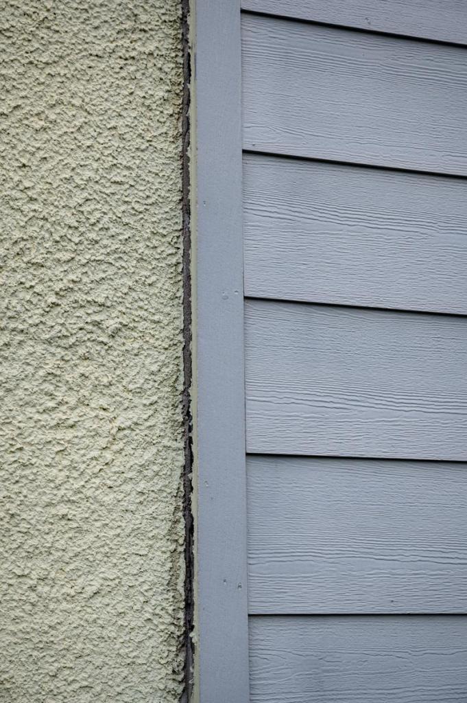 Water soil erosion damage is photographed at the Heights apartment complex on Tuesday, July 14, 2026.