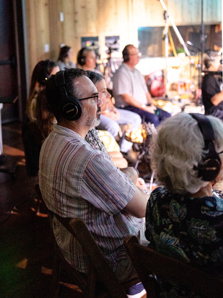 Audience members listen to Kalyn Fay perform during The Church Studio's "IN SESSION" recording experience on July 30, 2026.