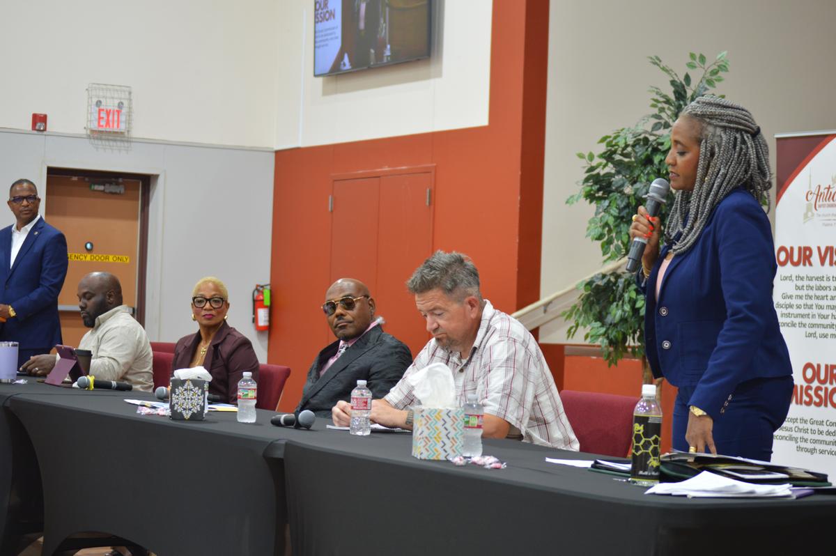 Candidates for Tulsa City Council's District 1 seat look on as incumbent Vanessa Hall-Harper speaks during a forum at Antioch Baptist Church on July 22, 2026.