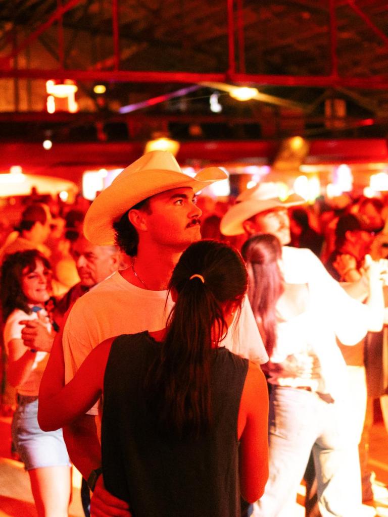 People dance at Tulsey Town Two-Step at Cain's Ballroom on July 24, 2026. 