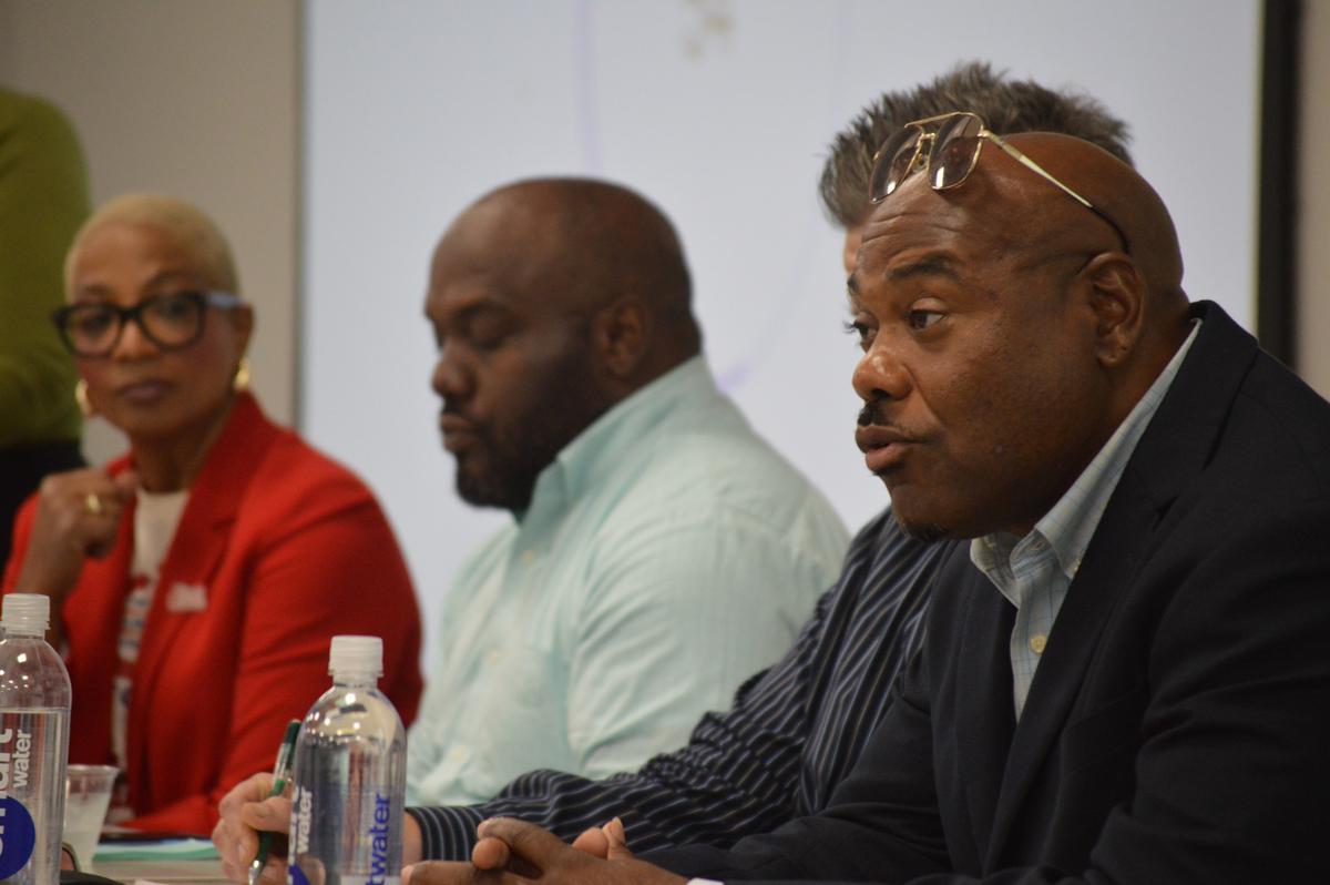 Mareo Johnson (right) and other candidates running for the Tulsa City Council District 1 seat, spoke with community members at a forum on July 23, 2026, about their leadership styles and how to bridge divides in the north Tulsa community.