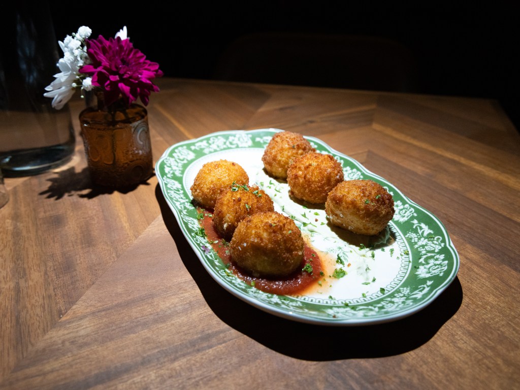 The arancini appetizer at Palace Rooms, 5200 S. Lewis Ave.
