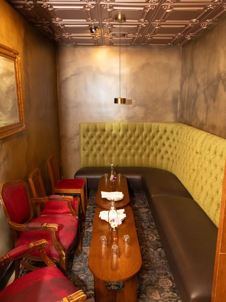 Booth space inside Palace Rooms, 5200 S. Lewis Ave., that can be reserved for free and used for happy hour or late night meetups.