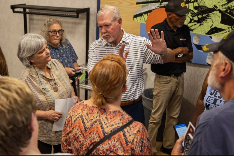Greg Wright, Capital Assets’ president, speaks with tenants at a Tulsa City Council resource session for Vesta Realty tenants on Thursday, July 30, 2026.