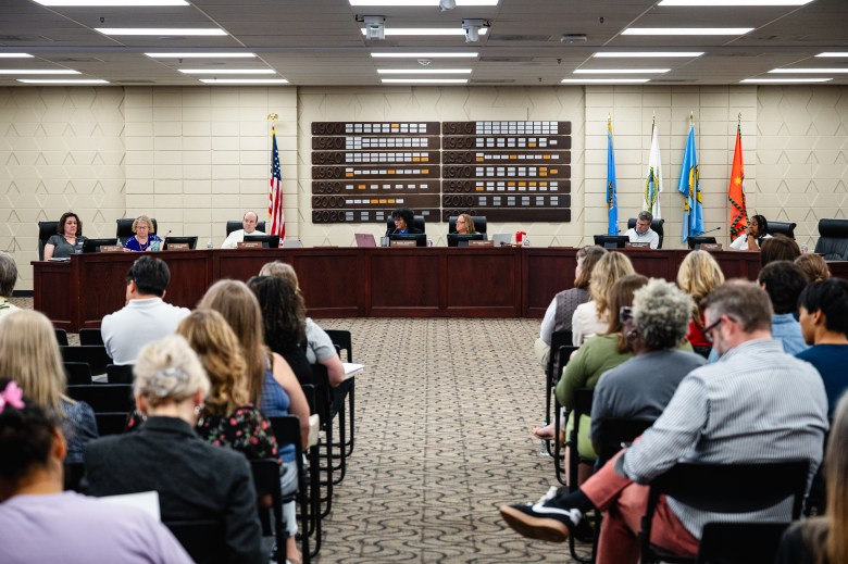 Community members packed a Sept. 21, 2026, Tulsa Public Schools board meeting, where district officials presented a proposal to close or consolidate 17 school sites.