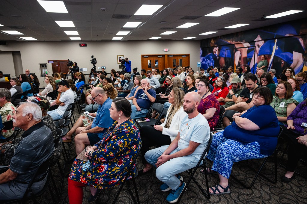 Community members pack a Sept. 21, 2026, Tulsa Public Schools board meeting to hear about proposed campus closures.