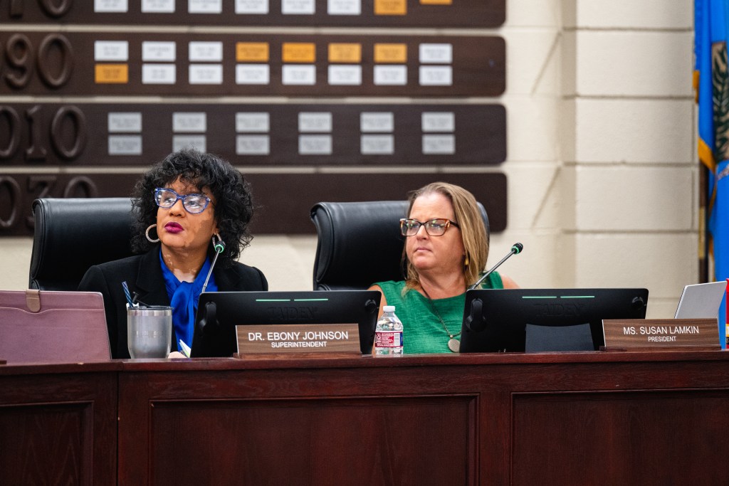 Tulsa Public Schools Superintendent Ebony Johnson, left, and board President Susan Lamkin look at data during the Sept. 21, 2026, Tulsa Public Schools board meeting.