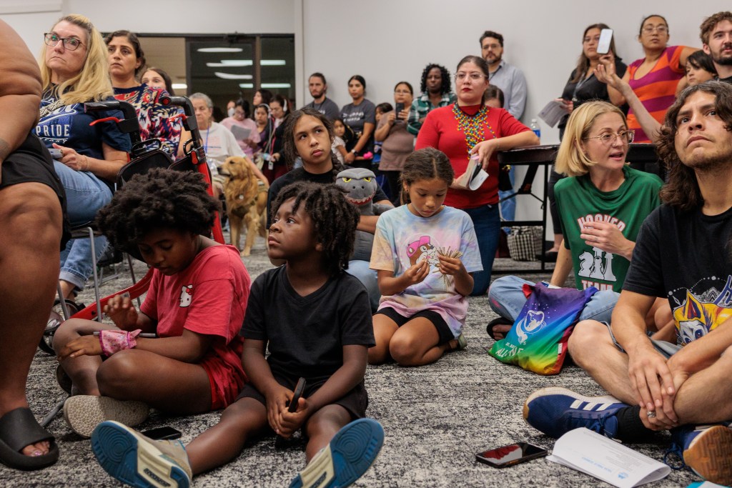 kids in aisles at library