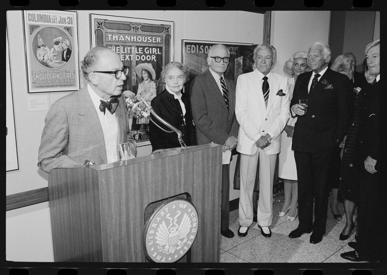 Daniel J. Boorstin stands at podium before group