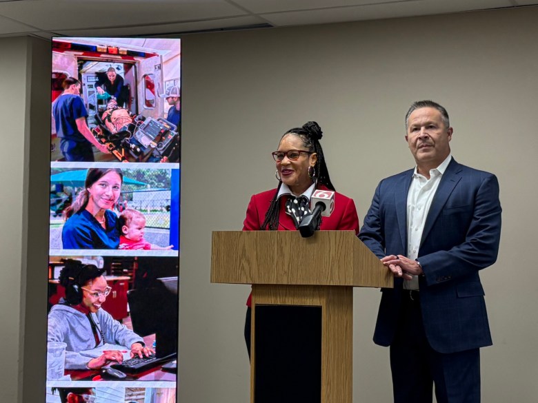 Tulsa Public Schools Superintendent Ebony Johnson, left, and Tulsa Tech Superintendent Steve Tiger, right, announce a new partnership turning Central High into a polytechnic program Oct. 5, 2026.