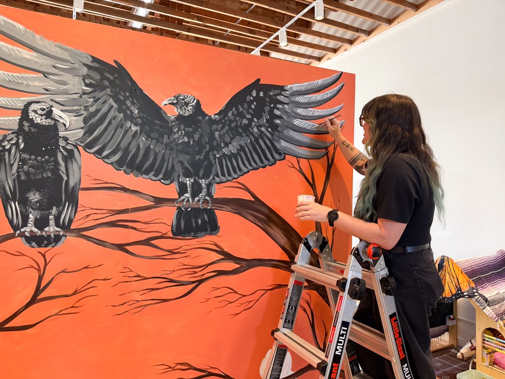 Kindra Swafford paints a mural