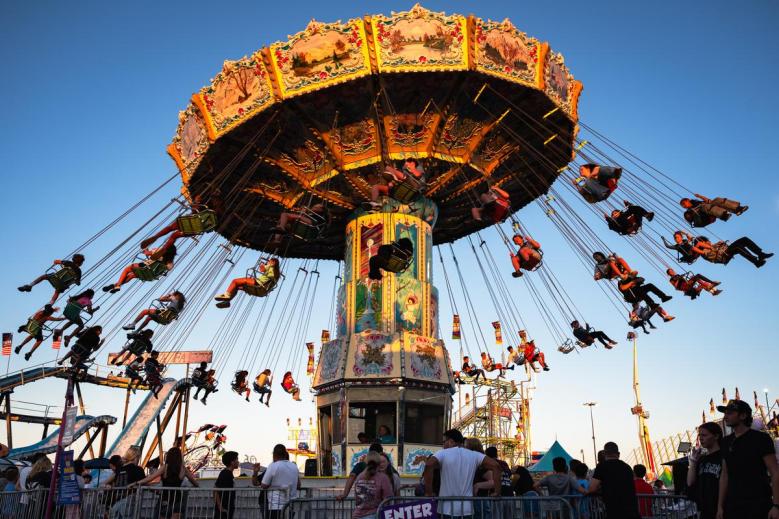 Attendees enjoy a ride at The Tulsa State Fair on Wednesday, Oct. 7, 2026.